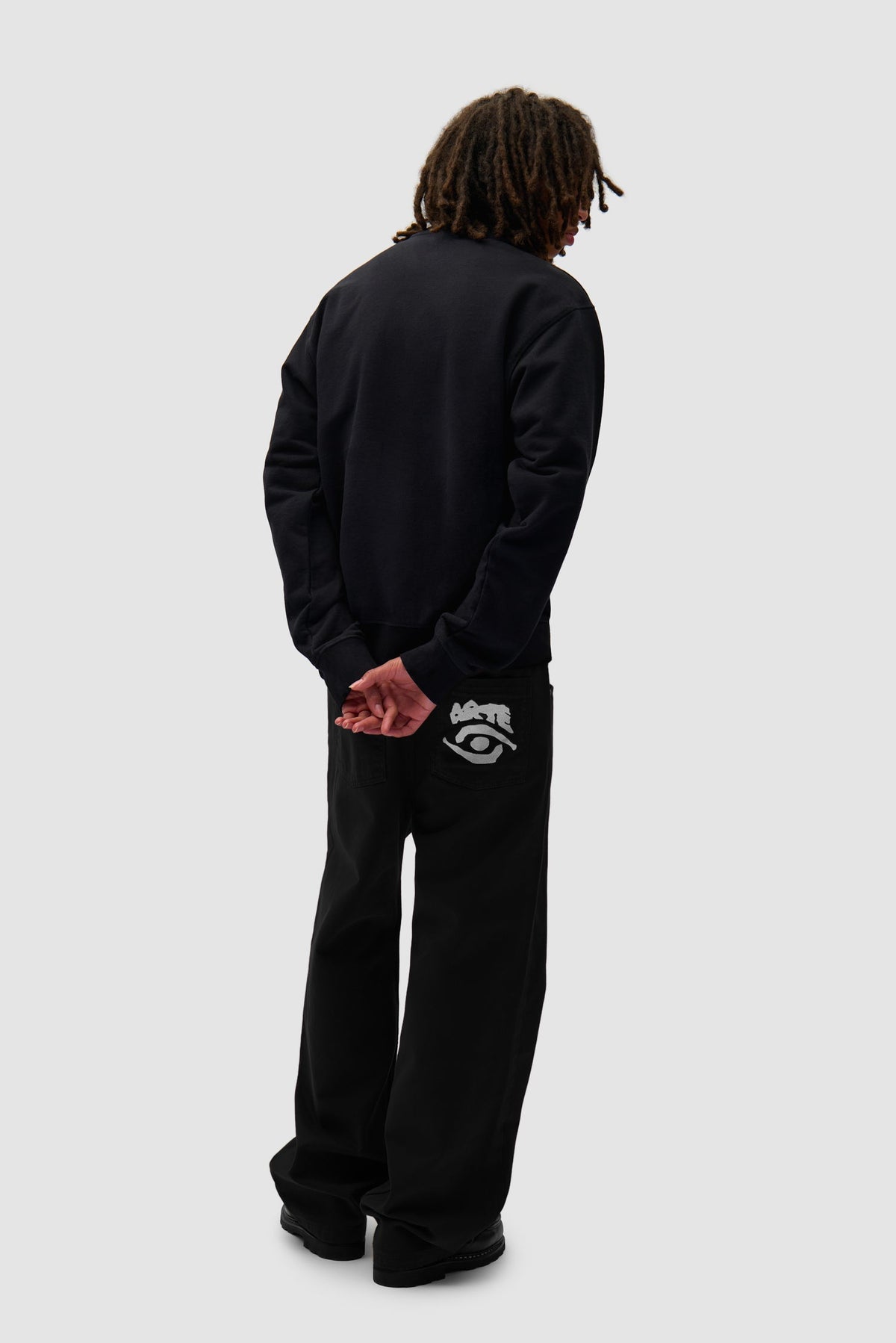 Pantalon graphique à poche arrière - Noir