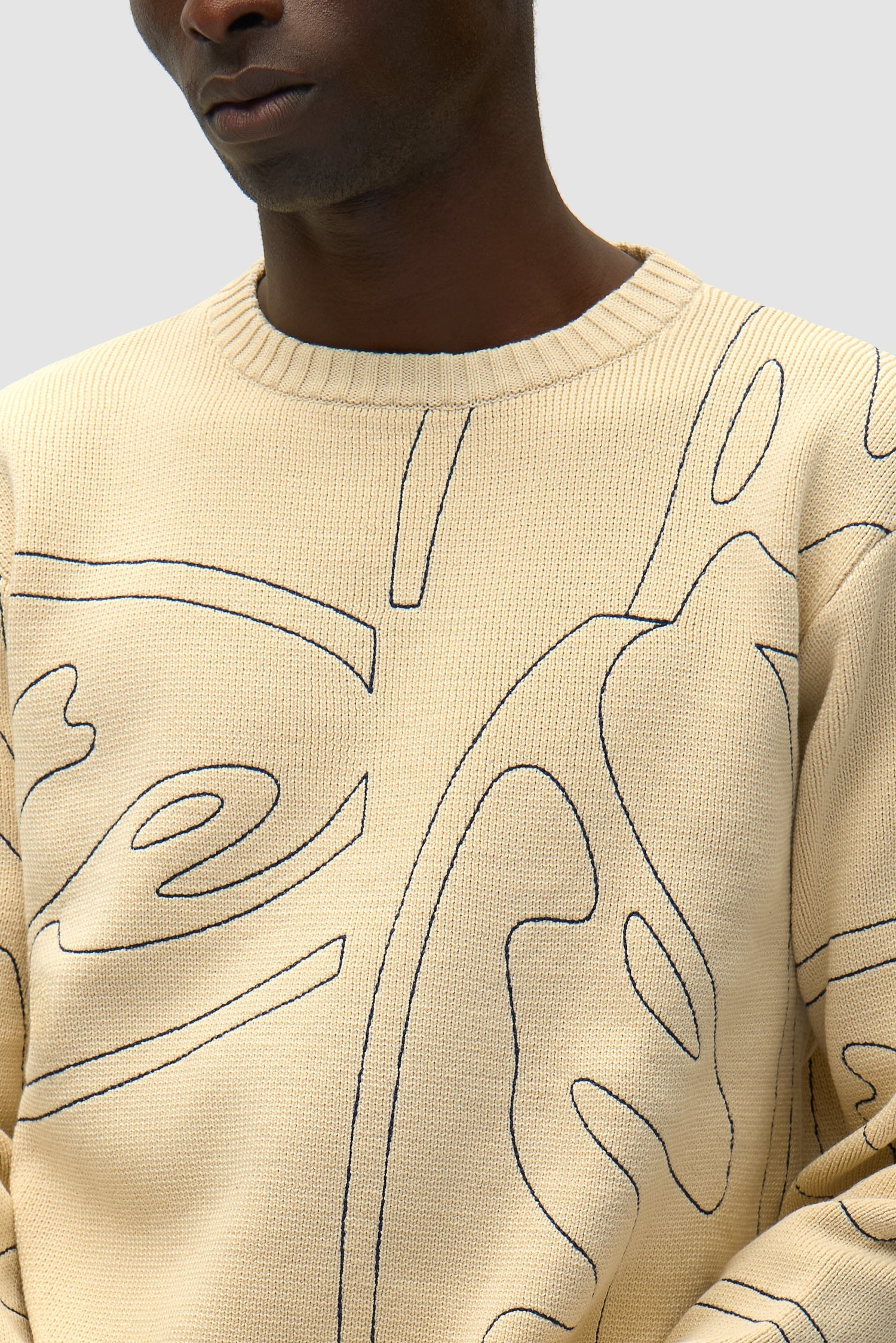 Pull en maille avec logo cercle sur toute la surface - Crème